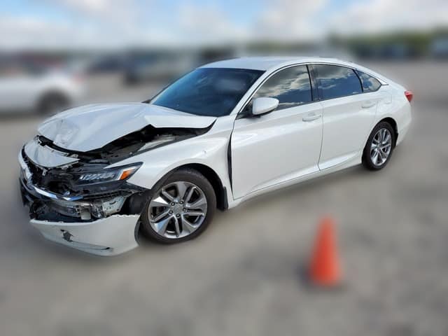 White 2019 Honda Accord LX sedan with heavy front-end collision damage at a salvage auction