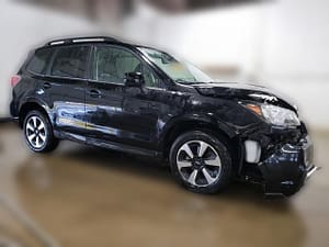 2017 Subaru Forester 2.5i Limited with front-end collision damage at a salvage auction