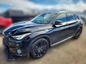 2020 Infiniti QX50 AWD with front-end collision damage at a salvage auction