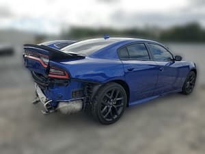 2022 Dodge Charger GT sedan with rear-end collision damage at a salvage auction
