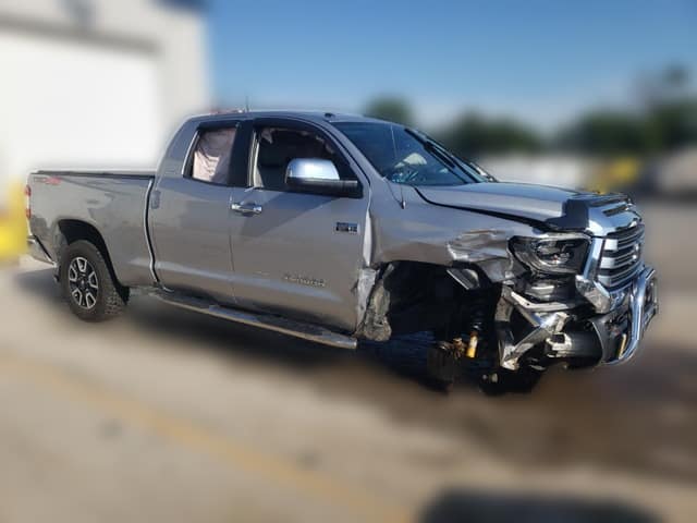 2018 Toyota Tundra Limited Double Cab pickup with front-end collision damage at a salvage auction
