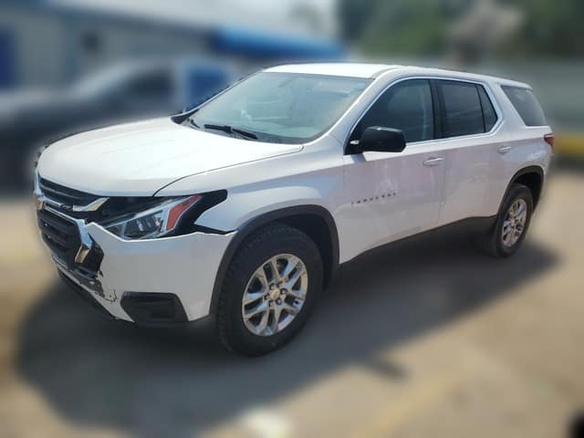 White 2021 Chevrolet Traverse LS SUV with front-end collision damage at a salvage auction