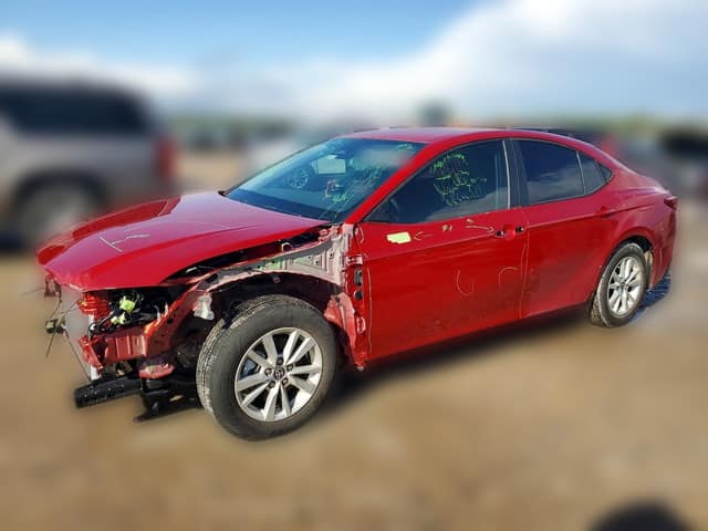 Red 2025 Toyota Camry LE Hybrid sedan with front-end collision damage at a salvage auction